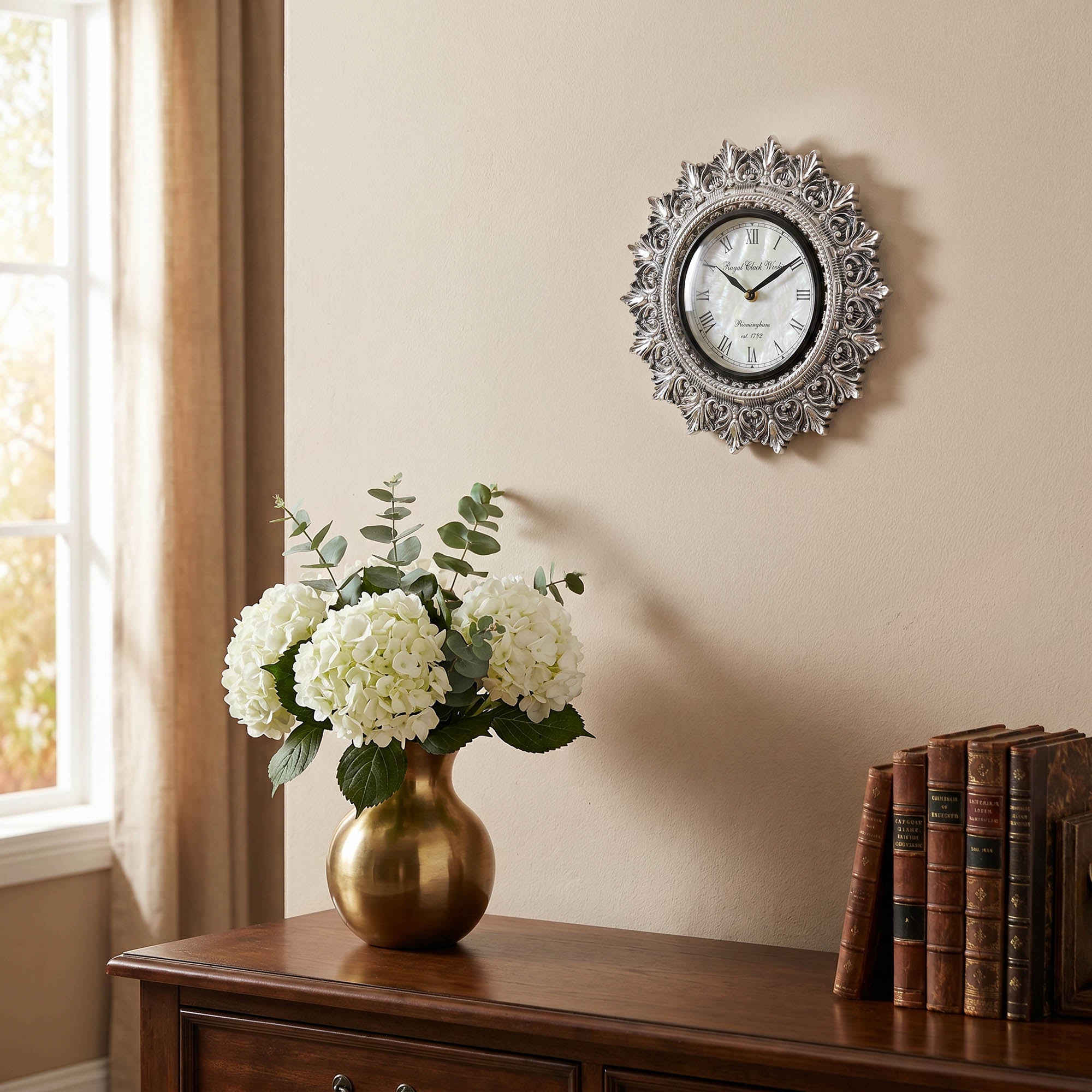 Ornate Sunburst 999 Silver Wall Clock