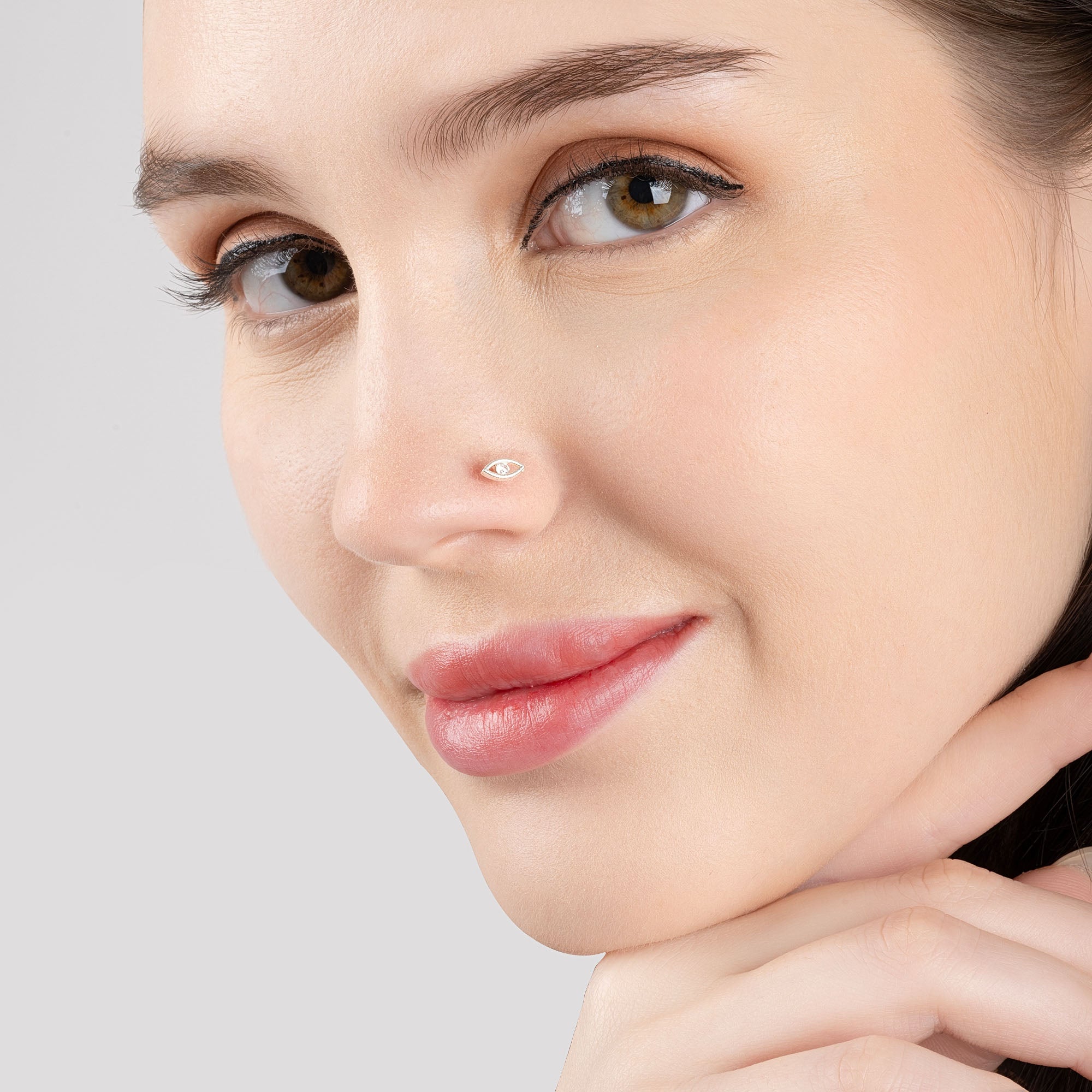 Gleaming Eye Nose Pin