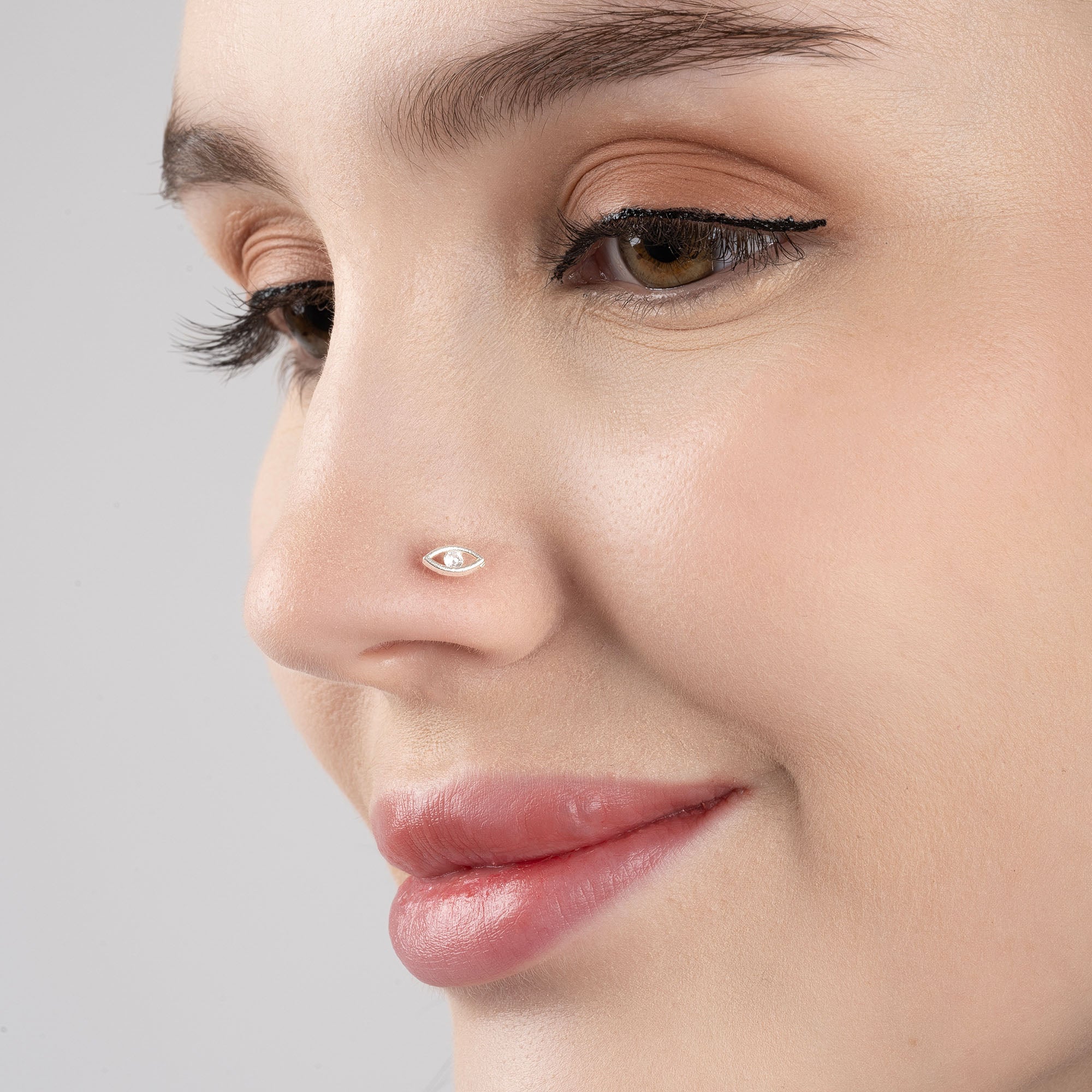 Gleaming Eye Nose Pin