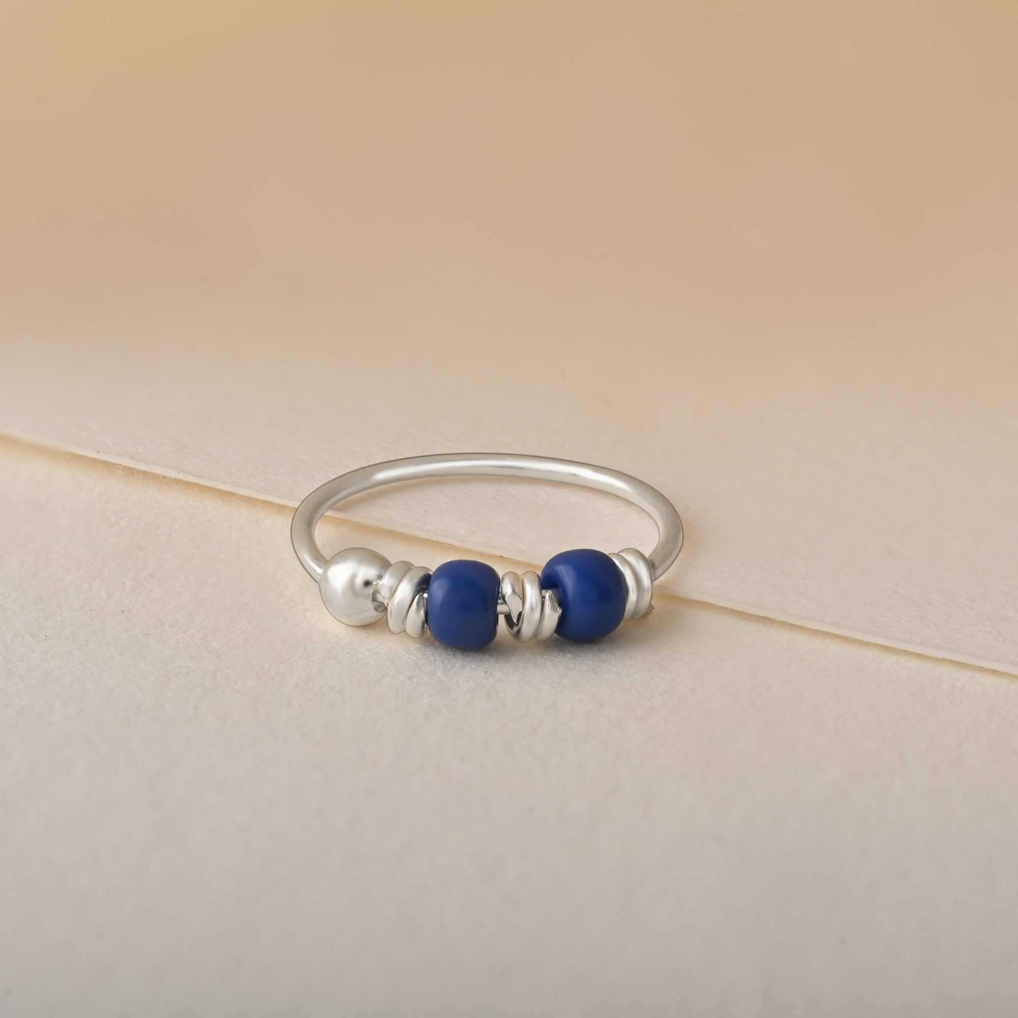 Small Blue Bead Nose Ring