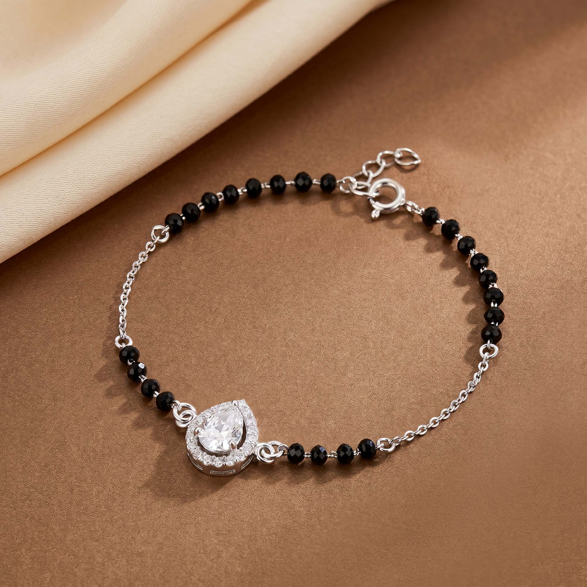 Pear-Cut Halo CZ Silver Bracelet