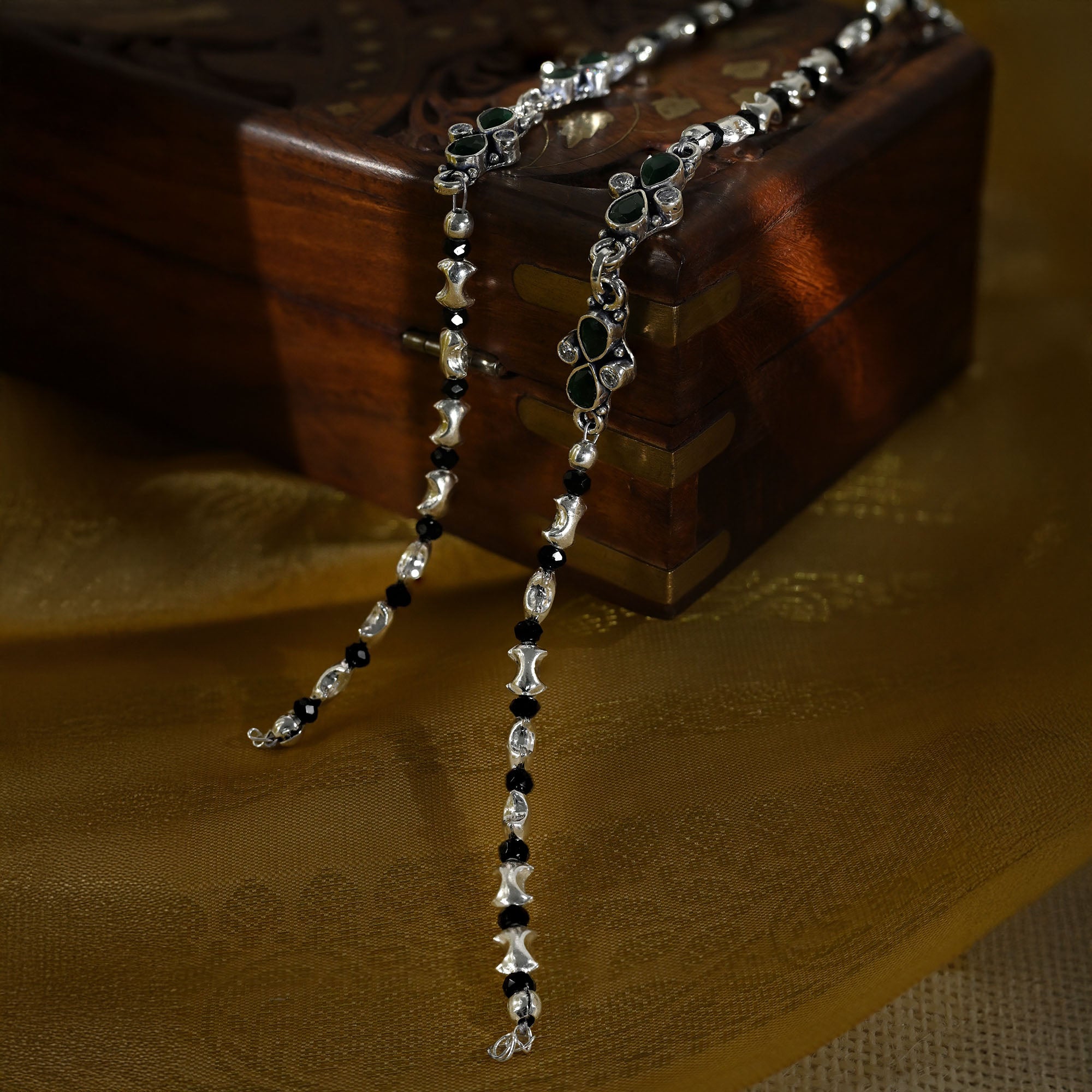 Green Stone Floral Motif Silver Anklets