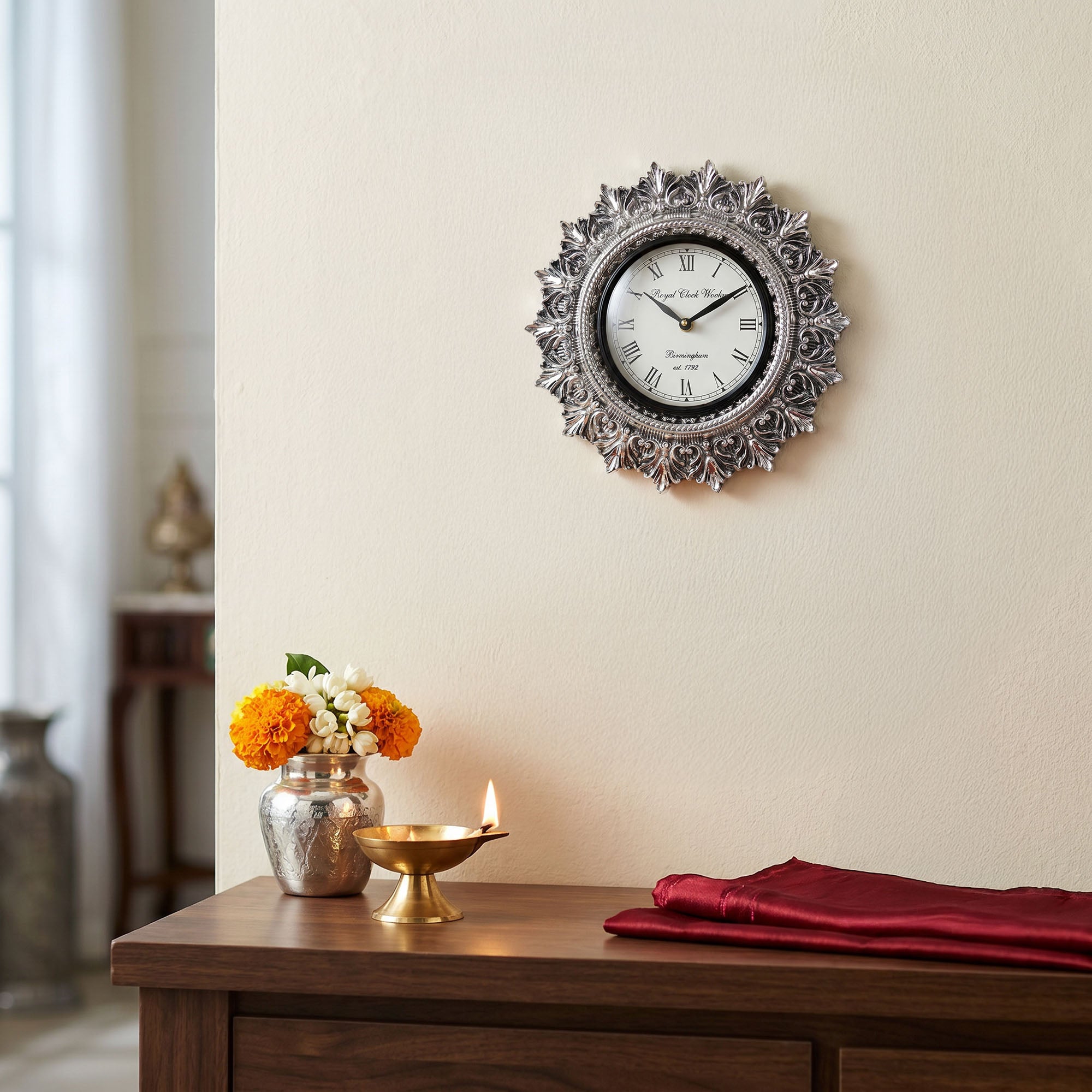 Ornate Sunburst 999 Silver Wall Clock