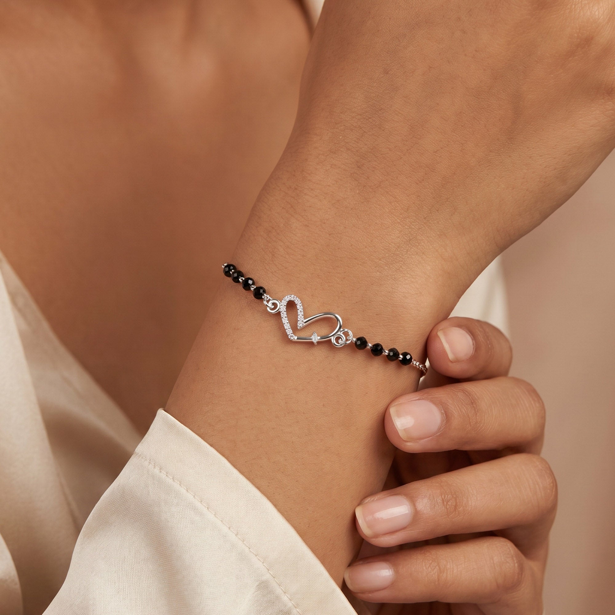 Intertwined CZ Heart Silver Bracelet