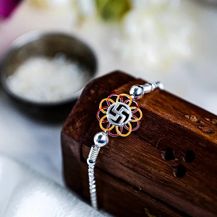 Silver Floral Swastik Rakhi - Touch925