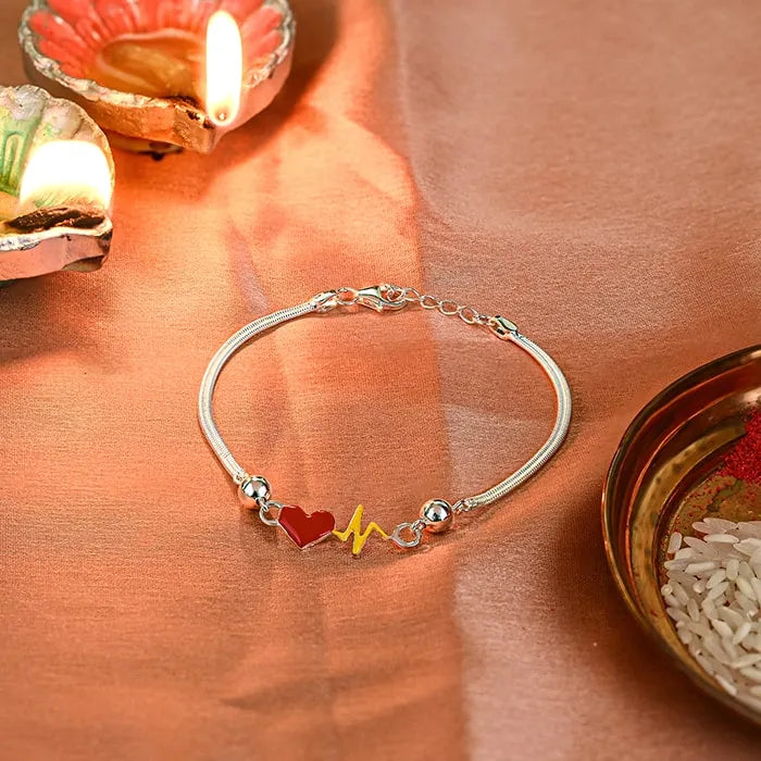 Silver Heart Yellow beat Rakhi - Touch925