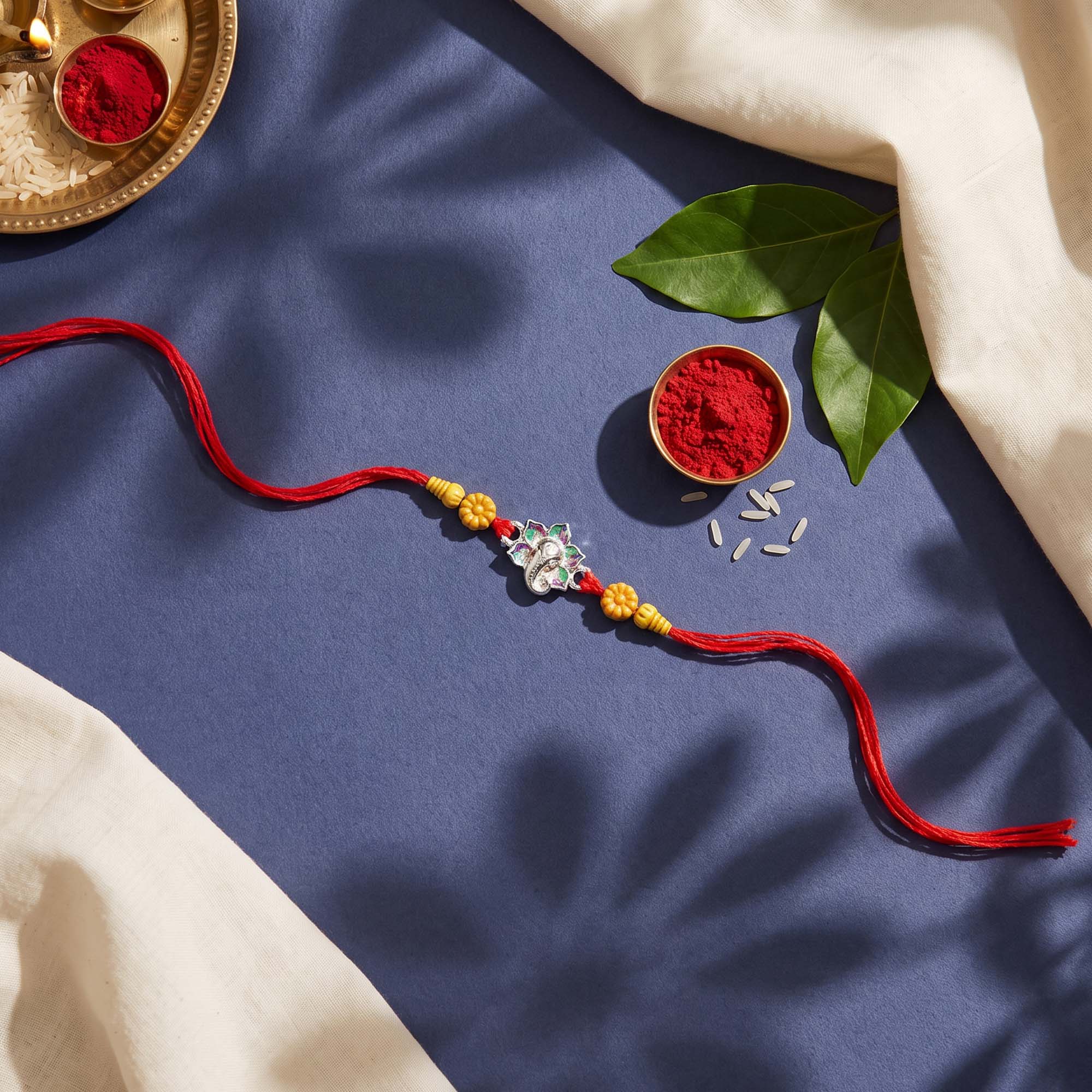 Ganesha Floral Silver Rakhi