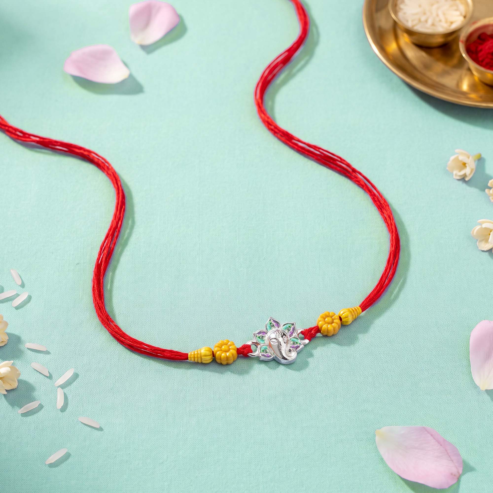 Ganesha Floral Silver Rakhi