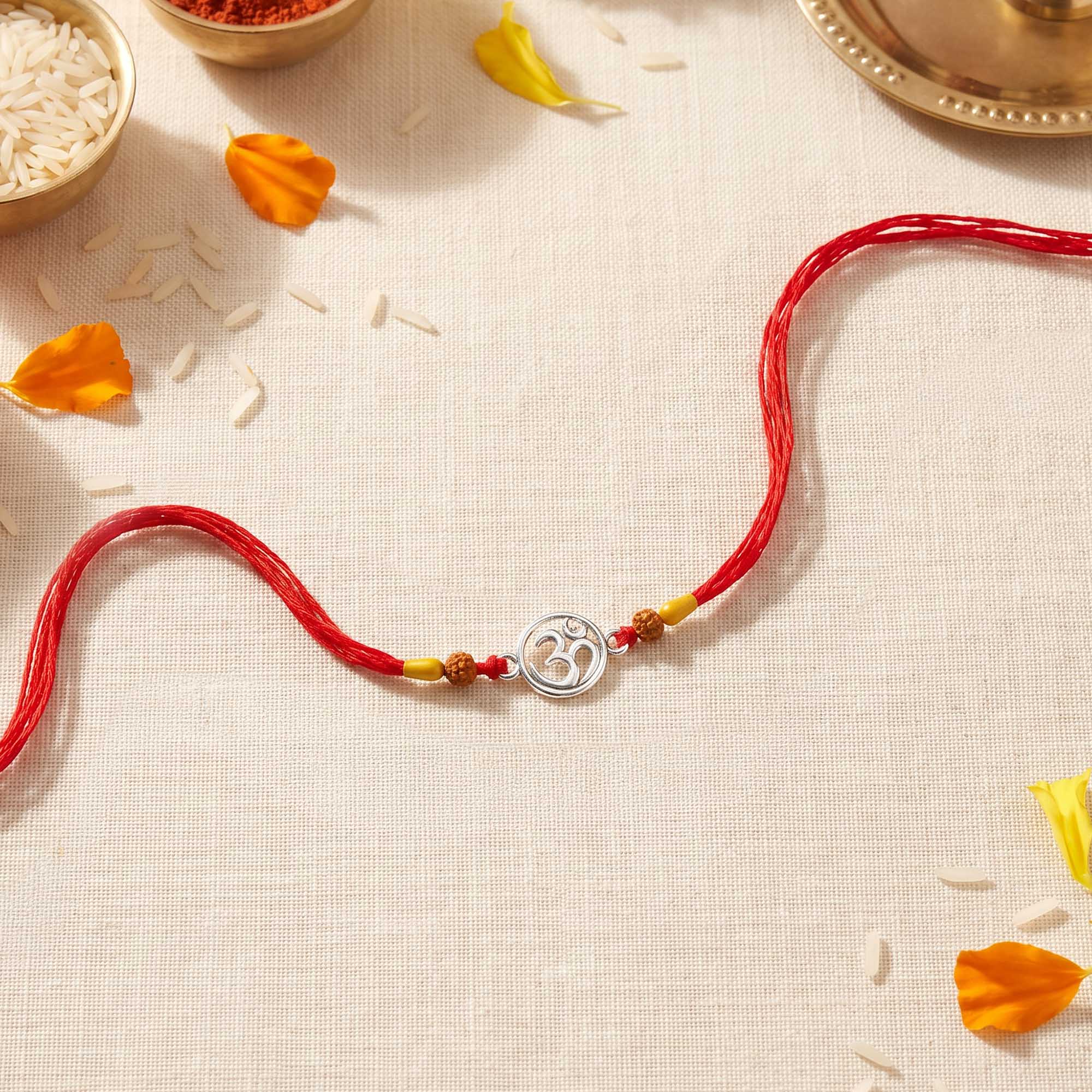 Om Silver Rakhi