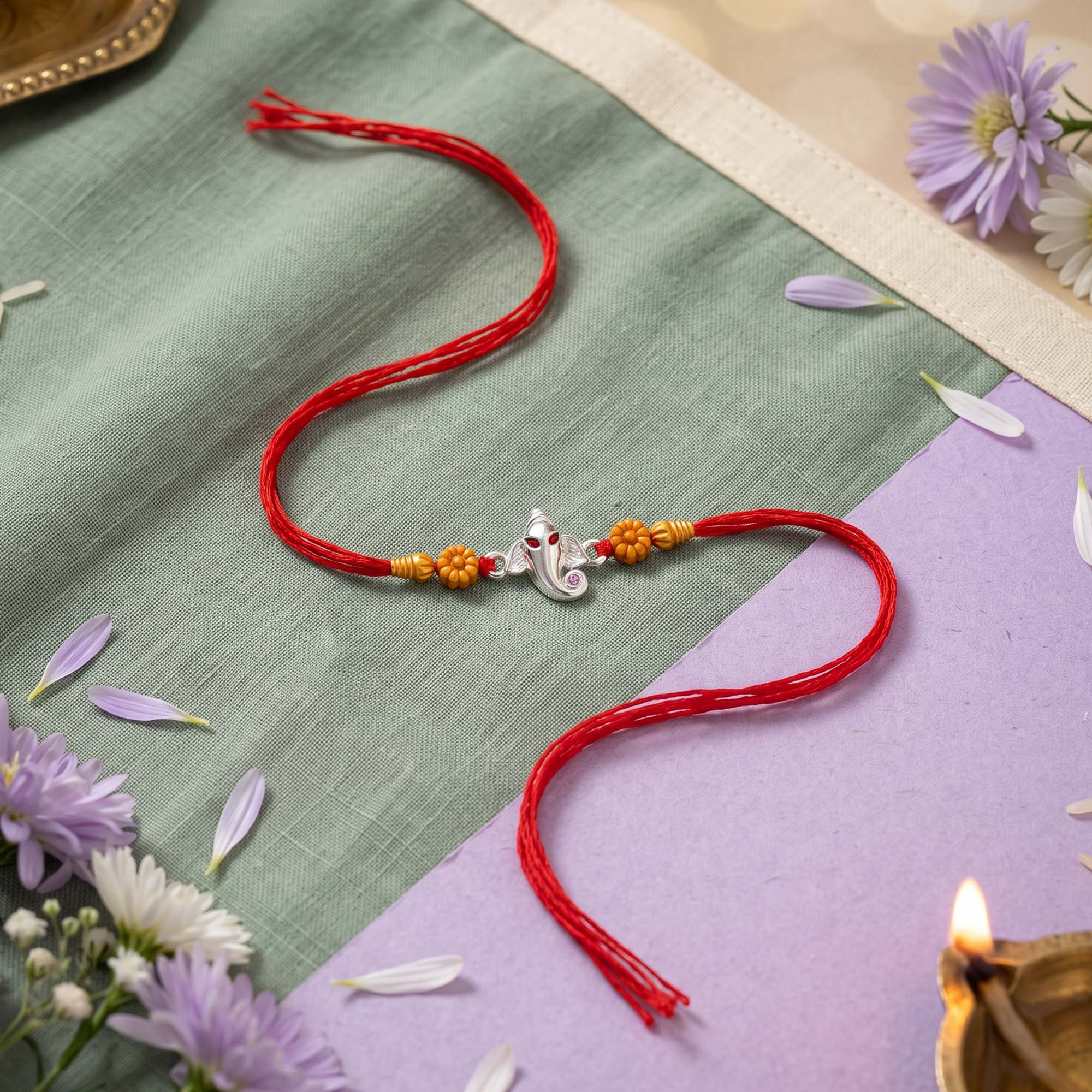 Ganesha Head Silver Rakhi