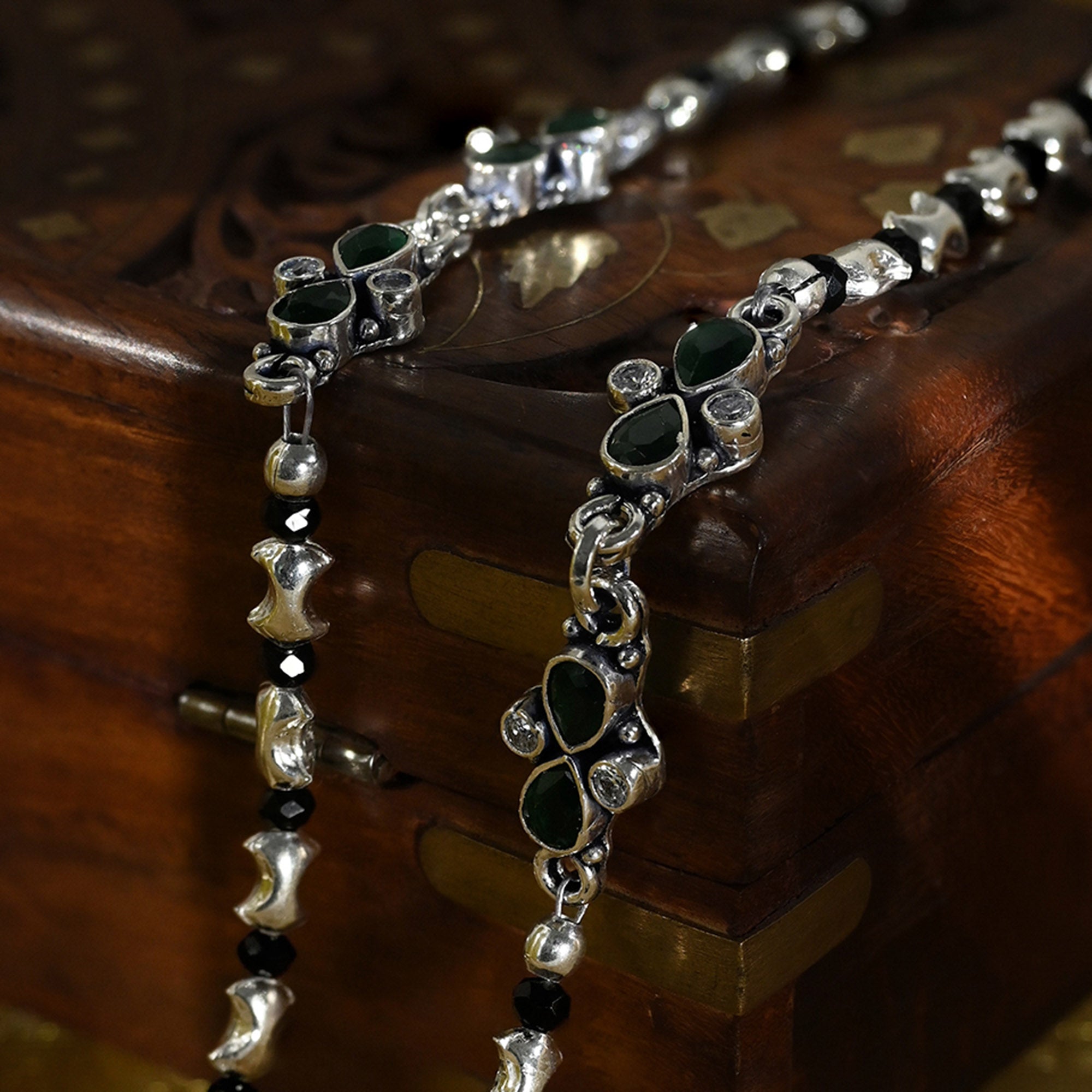 Green Stone Floral Motif Silver Anklets